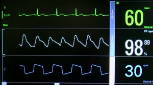 stock-footage-close-up-of-patient-monitor-displays-vital-signs-ekg-oxygen-saturation-spo-respiration-and